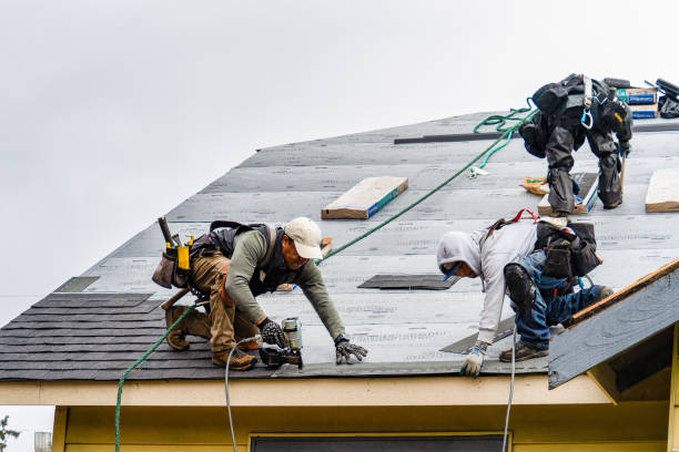 Professional Gutter Installation technician working in Hanscom AFB, MA